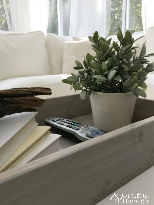 White sunroom with coffee table box