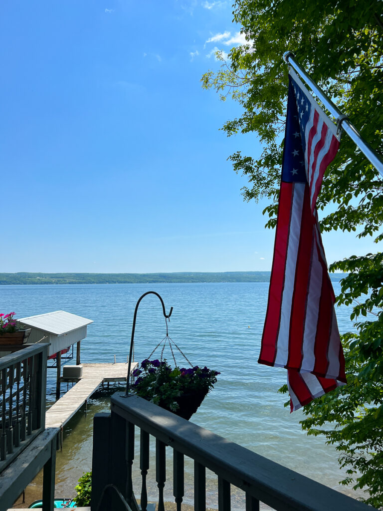 lake view with American flag being hung