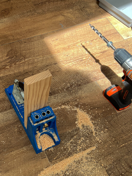 Kreg jig and drill with piece of wood
