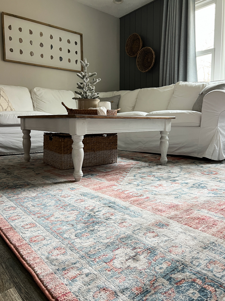 white sofa with rust color rug