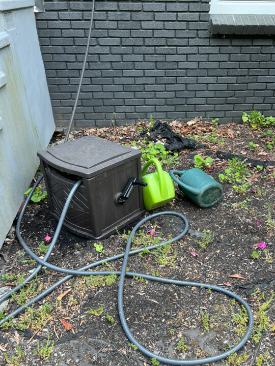 a hose in a reel box 